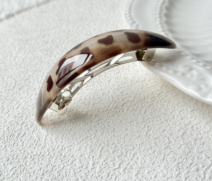 Oval acrylic hair barrette