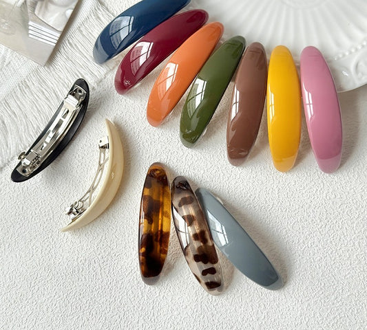Oval acrylic hair barrette