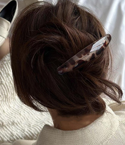 Oval acrylic hair barrette