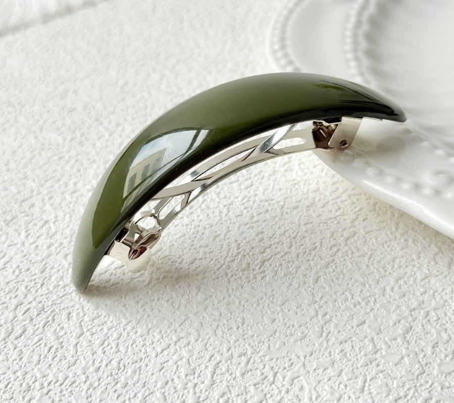 Oval acrylic hair barrette