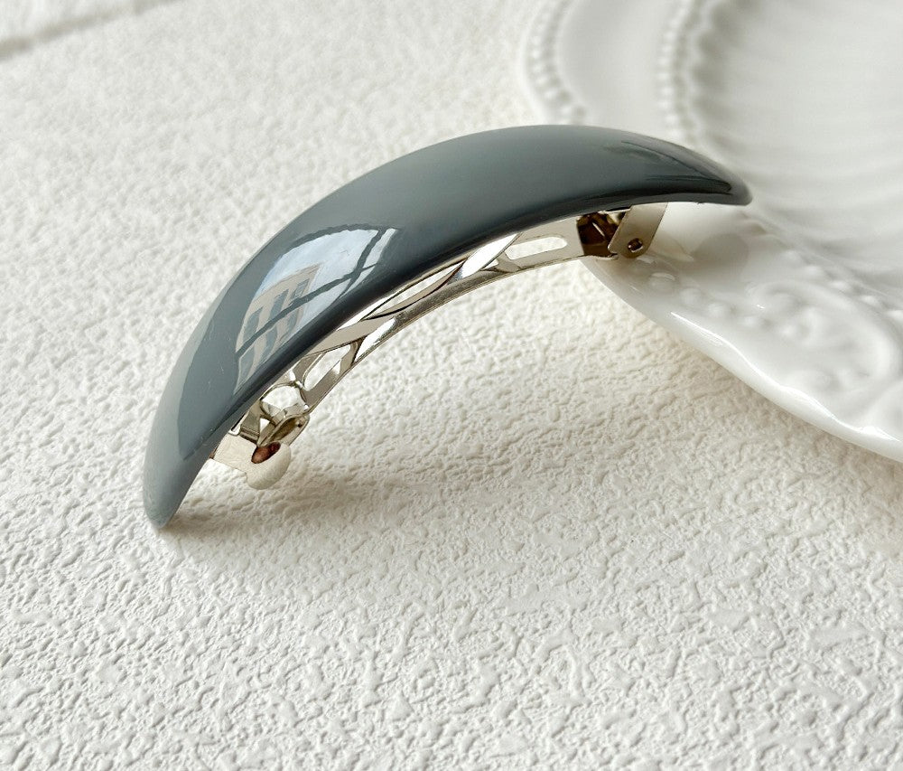 Oval acrylic hair barrette