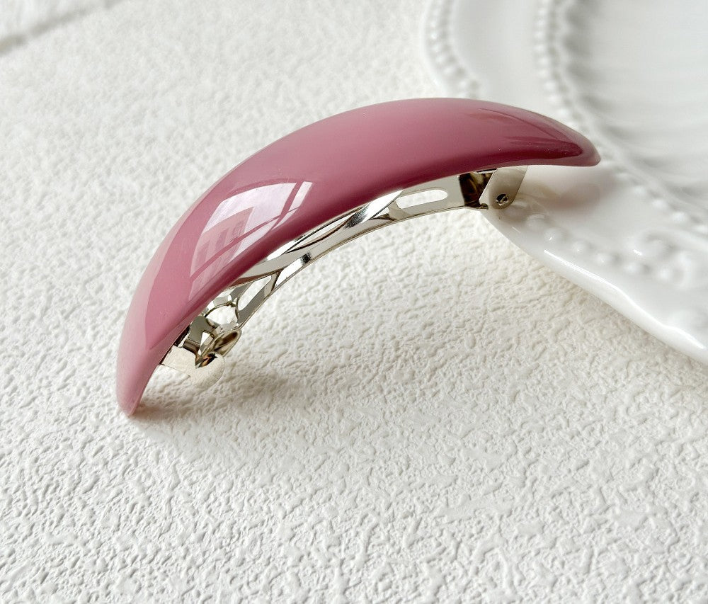 Oval acrylic hair barrette