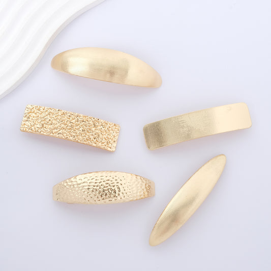 Gold metallic hair barrette