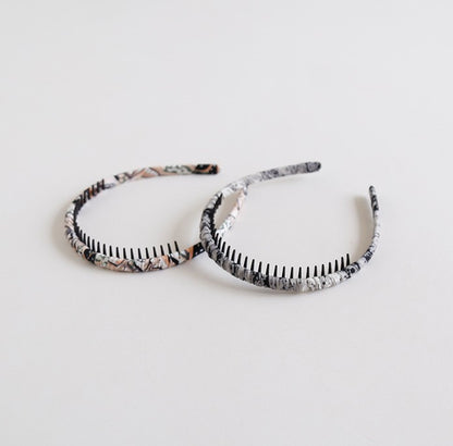 Ruched headband with teeth