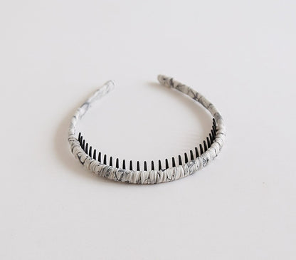 Ruched headband with teeth