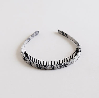 Ruched headband with teeth