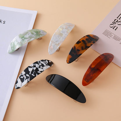 Oval arch resin hair barrette
