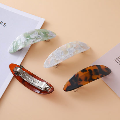 Oval arch resin hair barrette