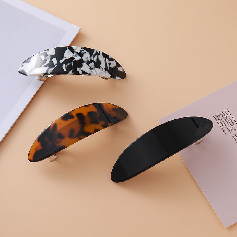 Oval arch resin hair barrette