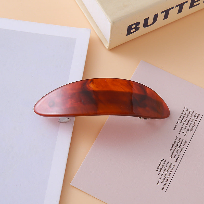Oval arch resin hair barrette