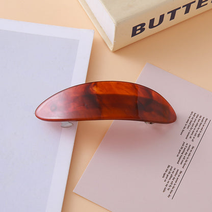 Oval arch resin hair barrette