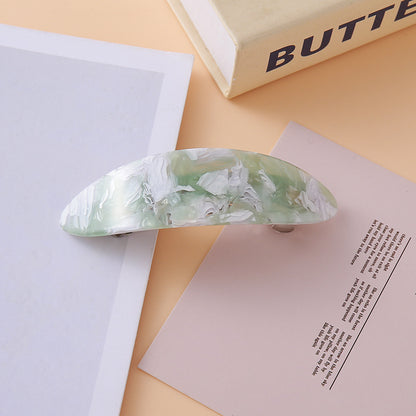 Oval arch resin hair barrette