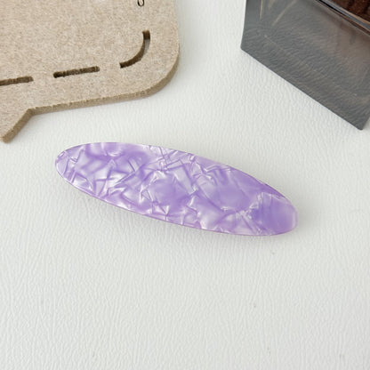 Stone patterned large flat oval resin hair barrette