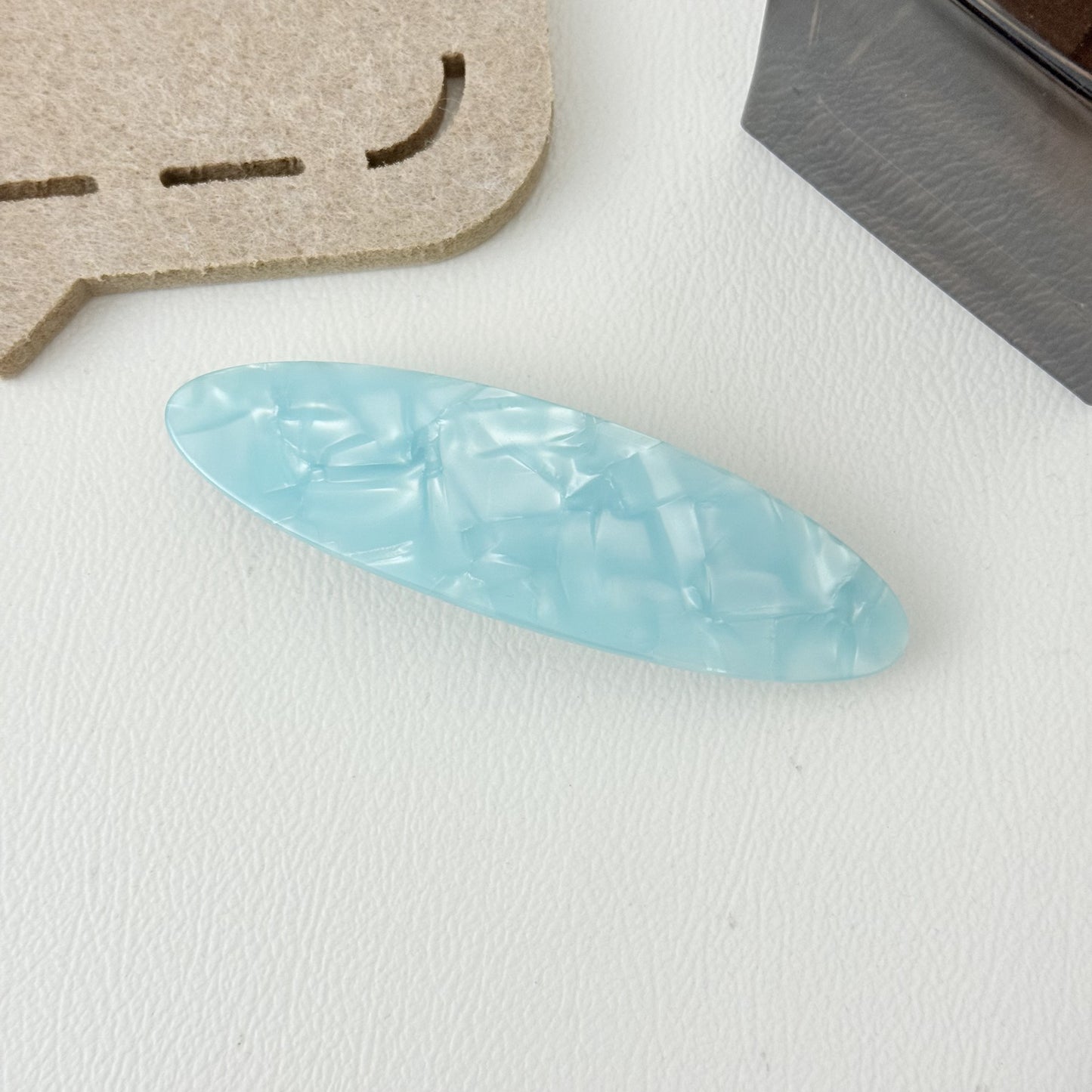 Stone patterned large flat oval resin hair barrette