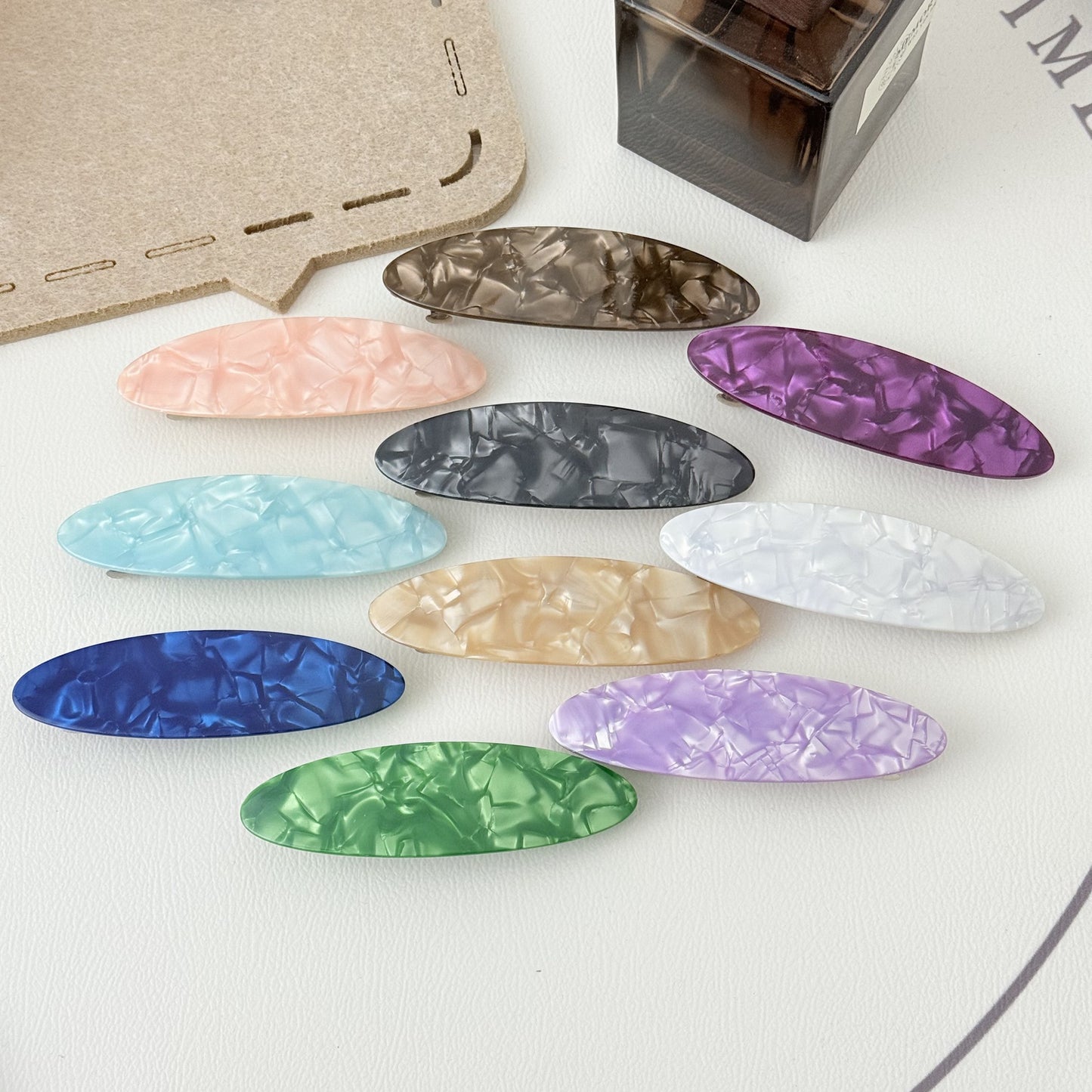 Stone patterned large flat oval resin hair barrette