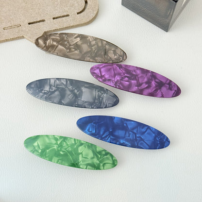 Stone patterned large flat oval resin hair barrette