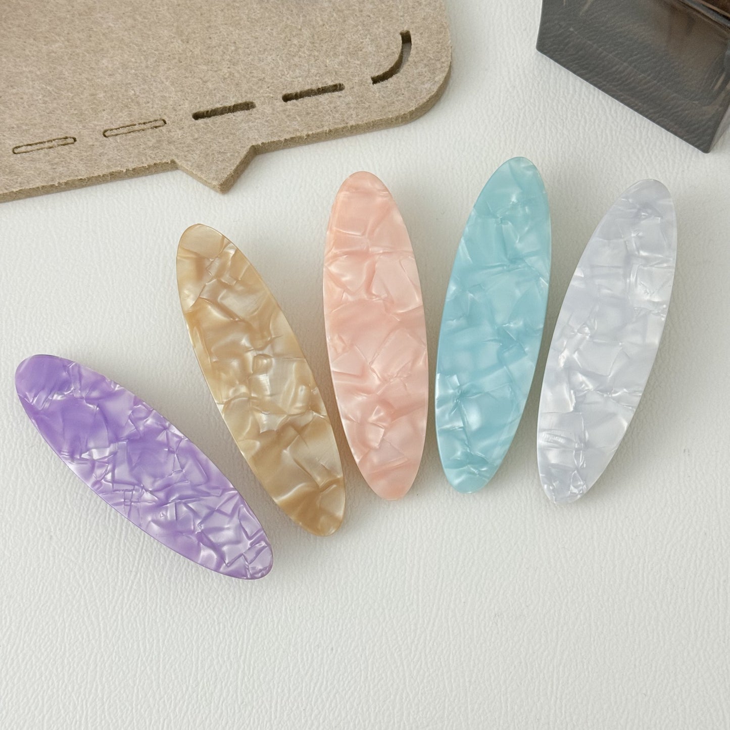 Stone patterned large flat oval resin hair barrette