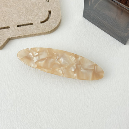 Stone patterned large flat oval resin hair barrette