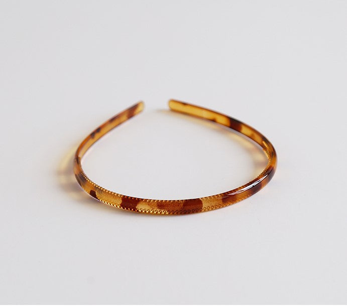 Dark amber coloured acrylic headband