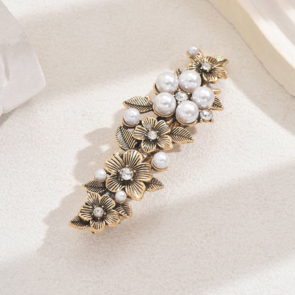Metal flowers hair barrette