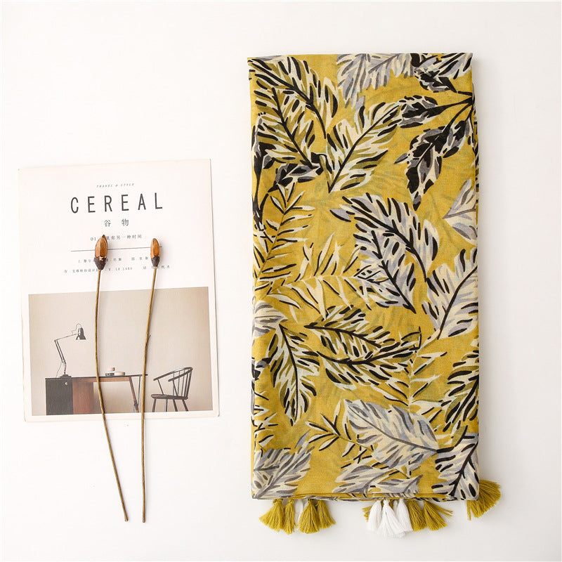 Black leaves print olive yellow scarf with tassels