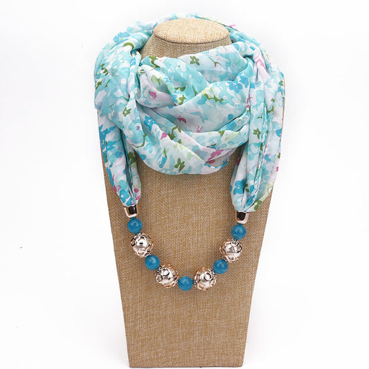 Chiffon infinity scarf with jewellery in light blue country flowers print
