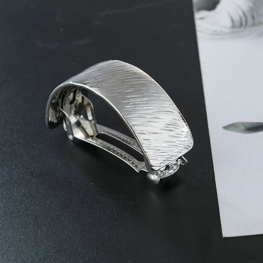 Slim pony tail barrette in brushed metal