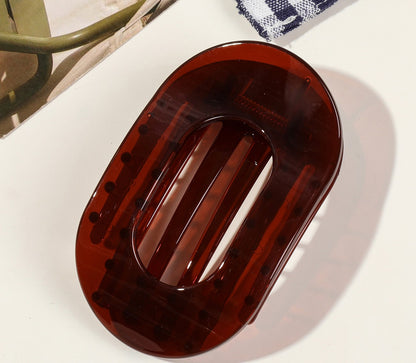 Oval flat hair claw