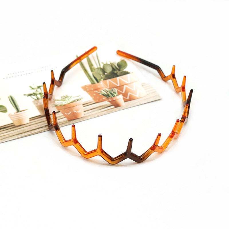 Wavy edge acrylic headband with teeth