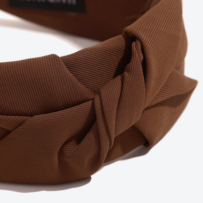 Twist knotted top headband