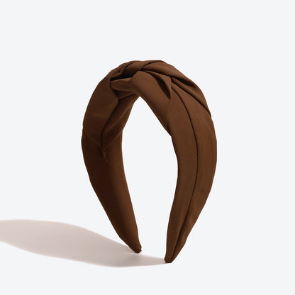 Twist knotted top headband