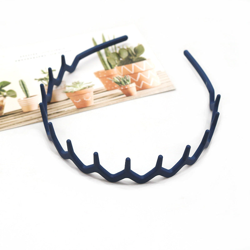 Wavy edge acrylic headband with teeth