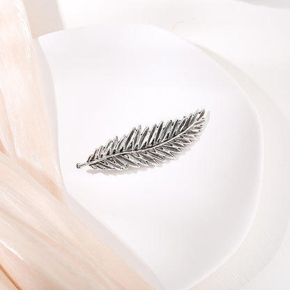 Metallic feather hair barrette