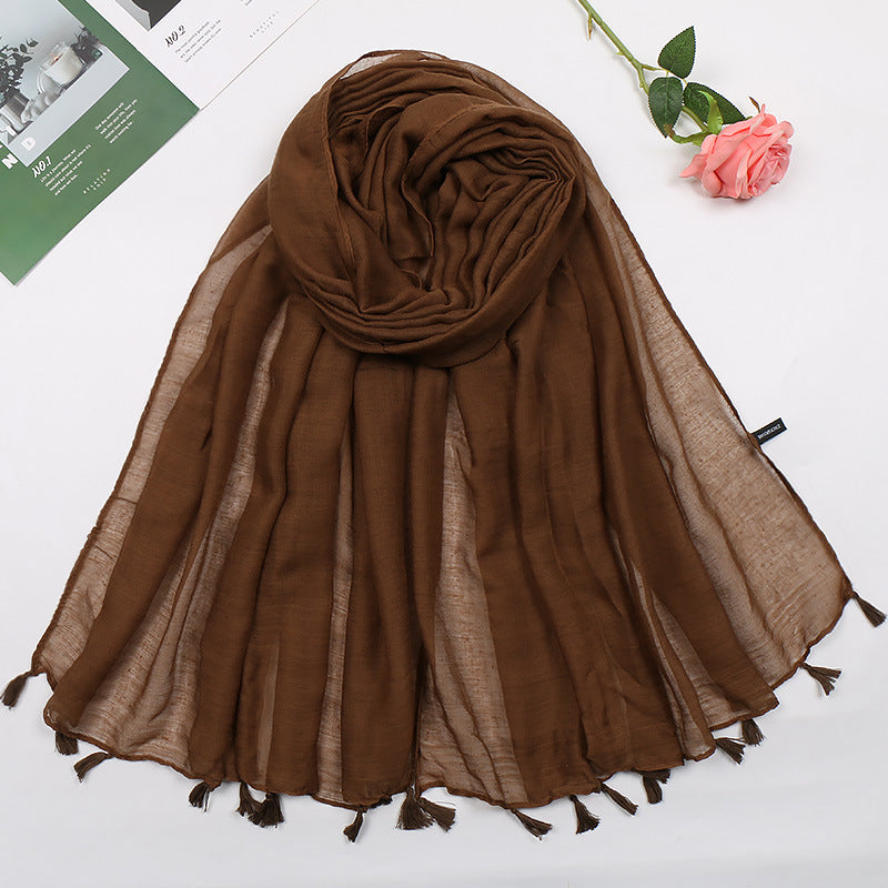 Plain long scarf with tassels