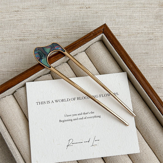 Metallic hair fork