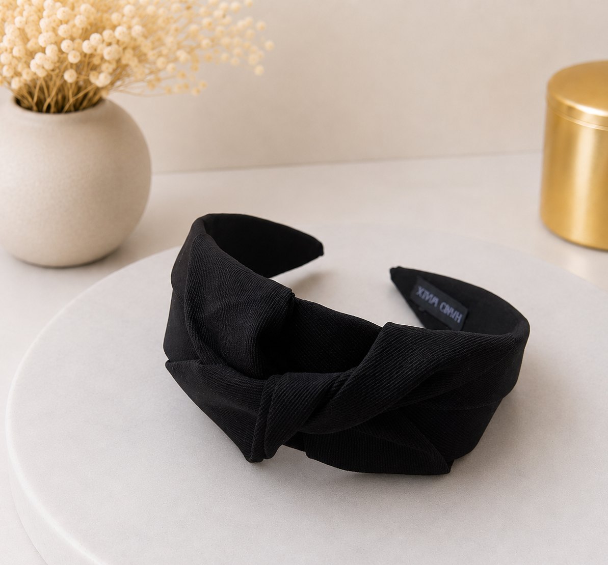 Twist knotted top headband