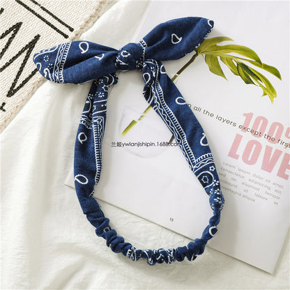 Paisley print elastic headband with bow