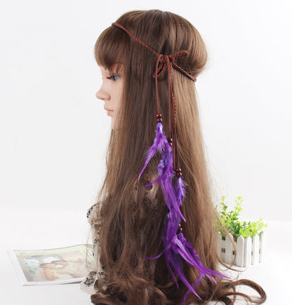 Braided brown suede band with purple feather hair tie