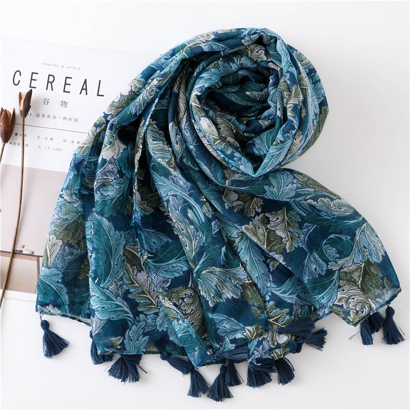 Teal green leaves print scarf with tassels