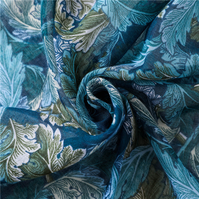 Teal green leaves print scarf with tassels