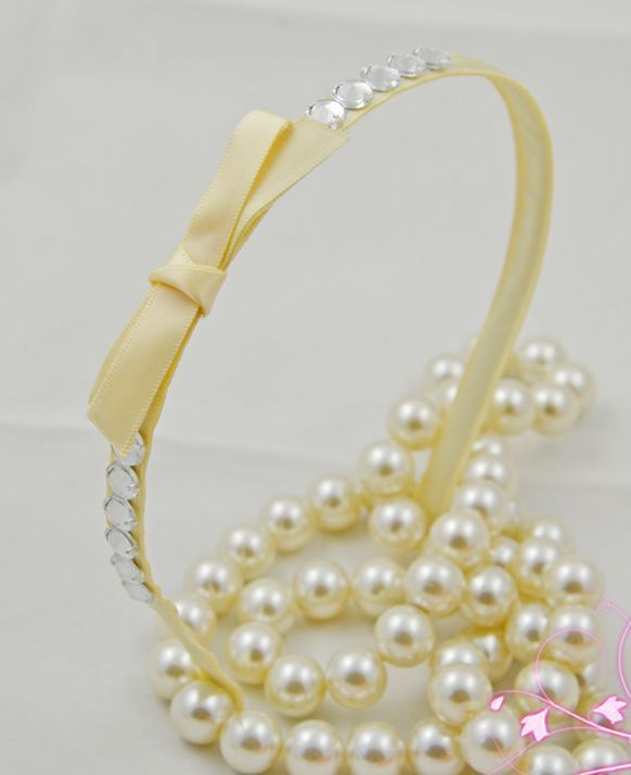 Champagne beige headband with bow & clear gems