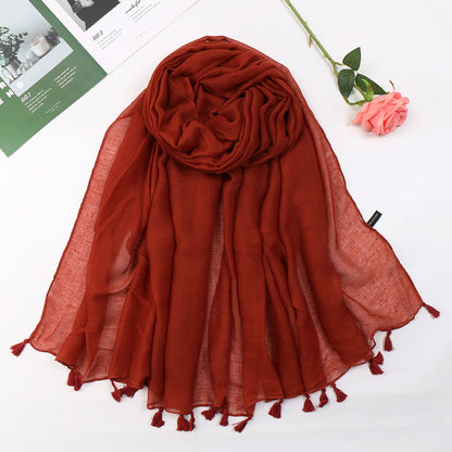 Plain long scarf with tassels