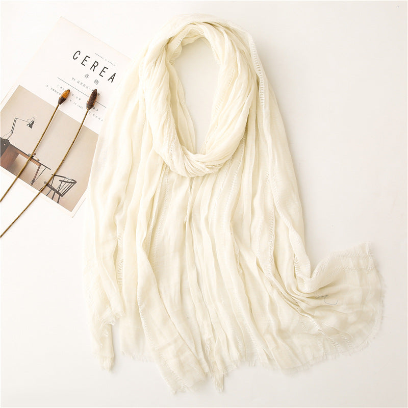 Fringed hollow solid long scarf