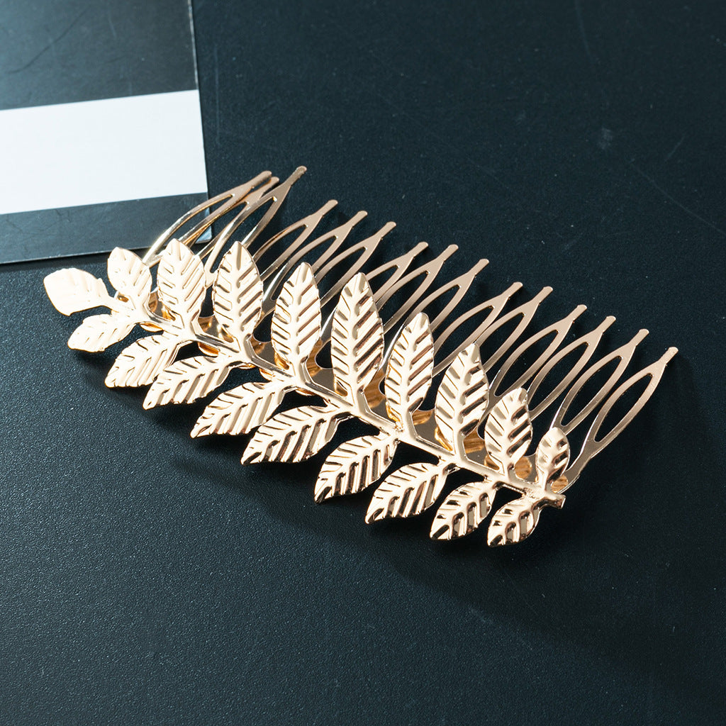 Metallic leaf branch hair comb