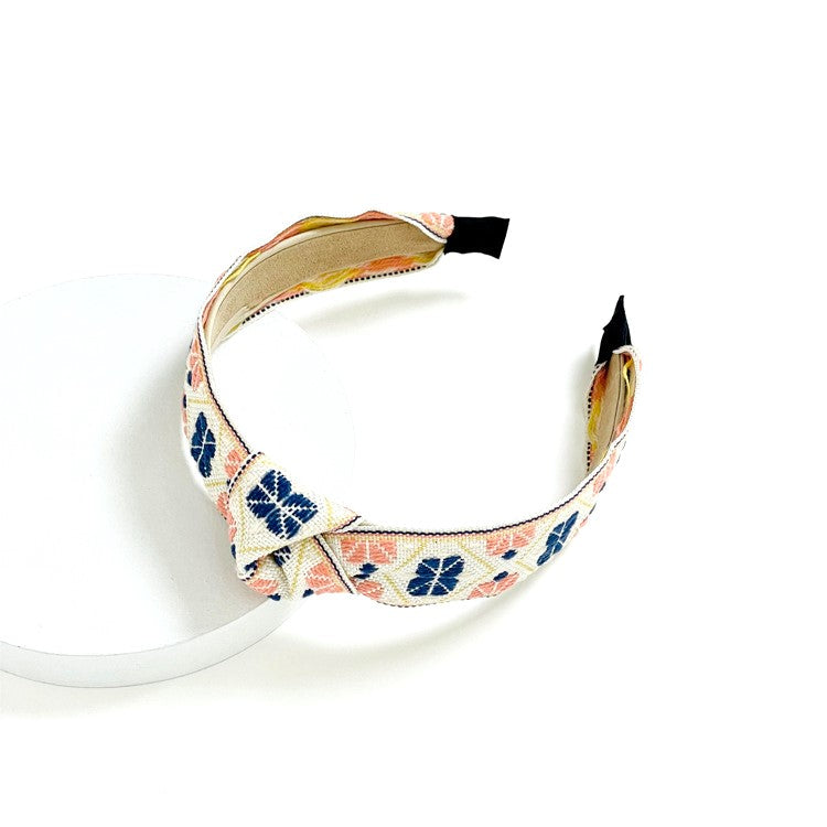 Multi-coloured embroidered knotted headband