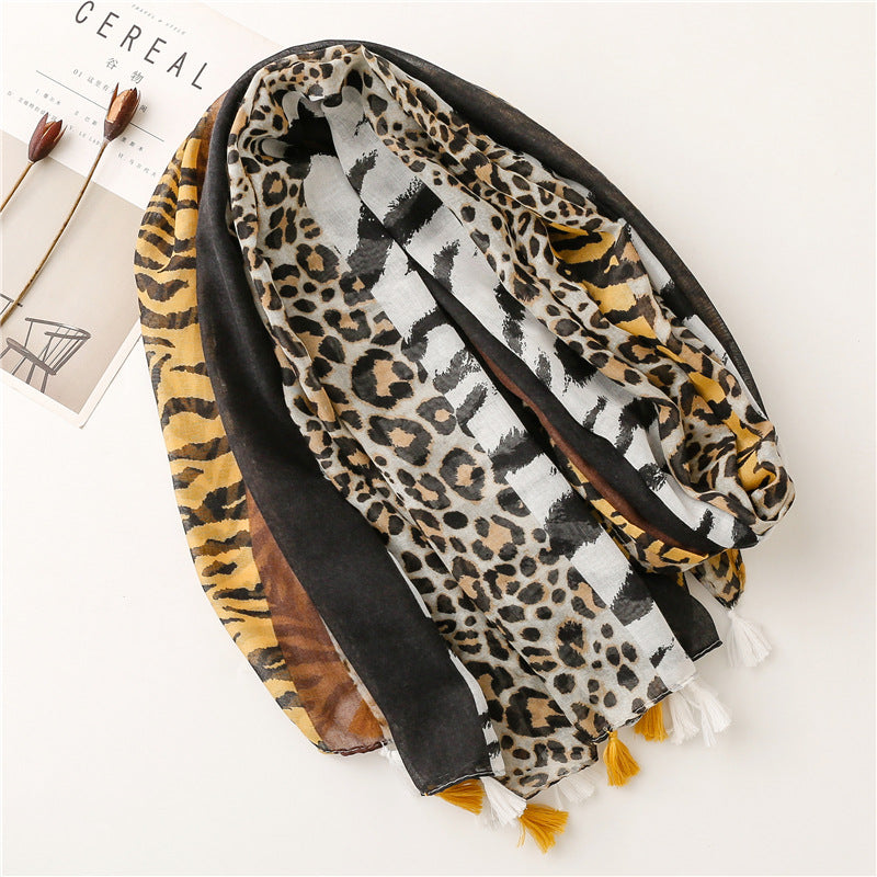 Mixed animal prints scarf with tassels