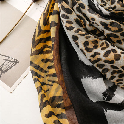 Mixed animal prints scarf with tassels