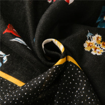 Black long scarf with tassels in multicolour flowers print
