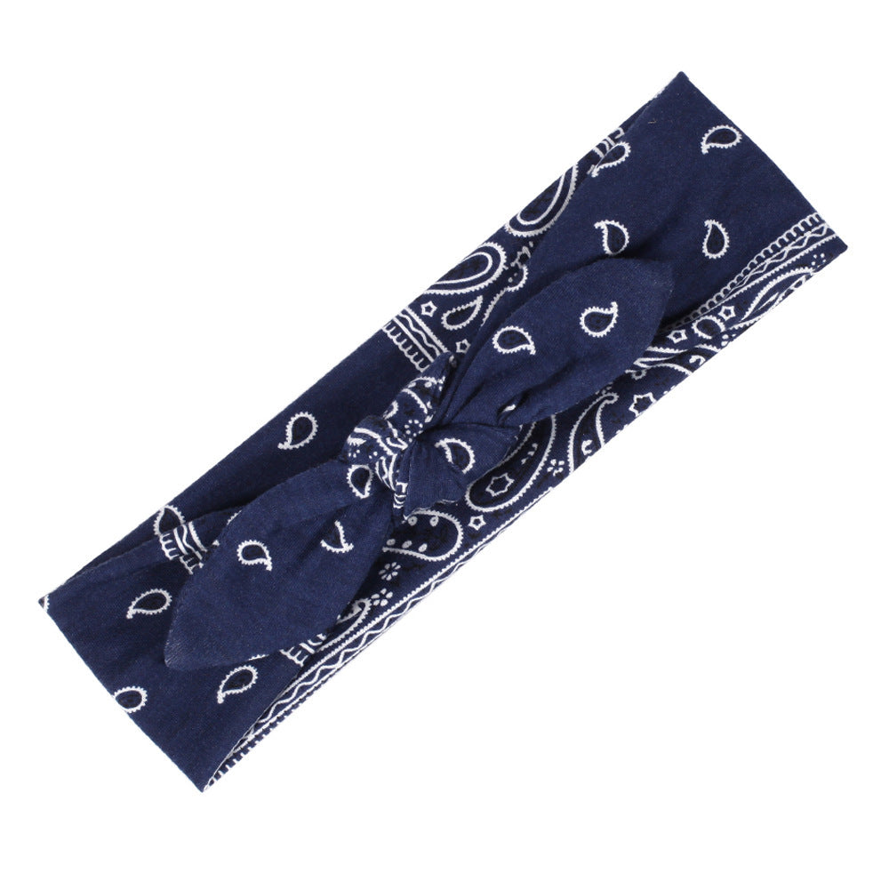 Paisley print stretchy headband with bow