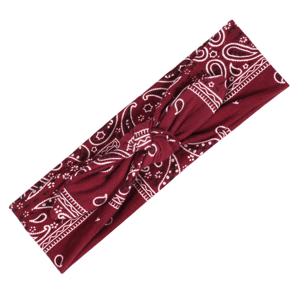 Paisley print stretchy headband with bow